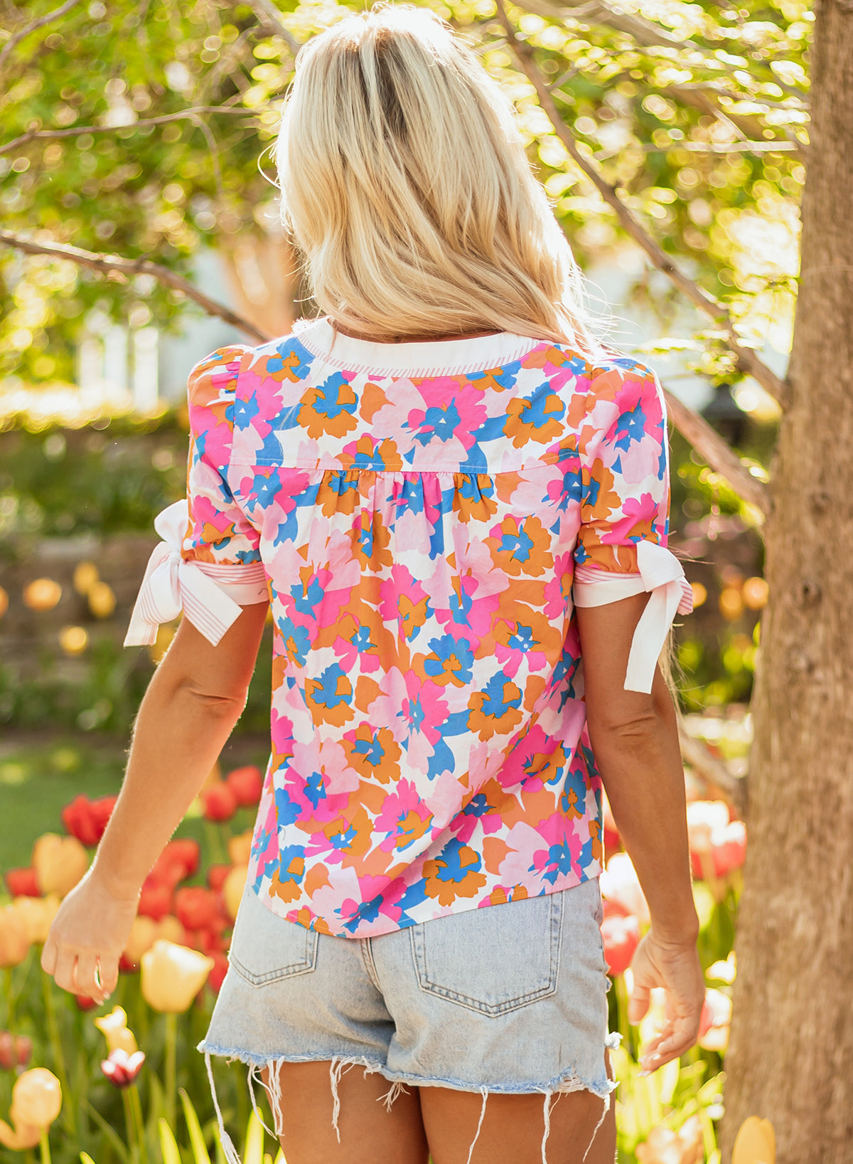 Aleia Floral Knotted Short Sleeve Blouse